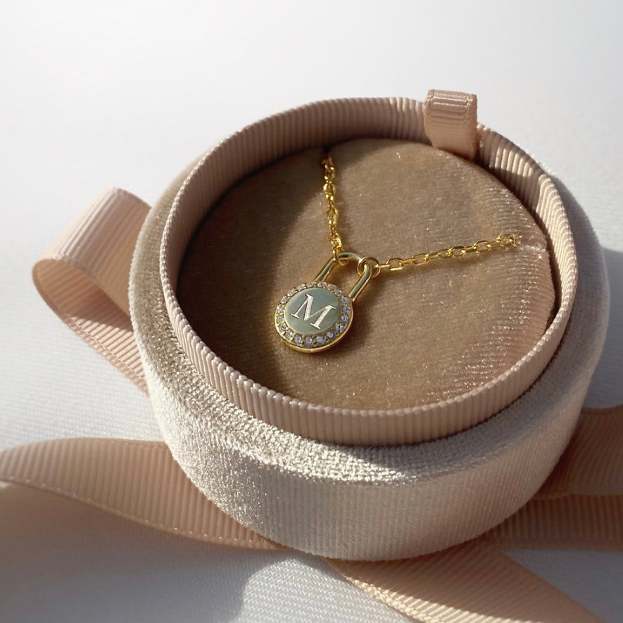 Initial clearance lock necklace